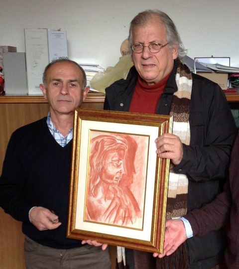 G. Bartolomeo consegna il quadro al sindaco di Olzai (F. M. Nurchi)